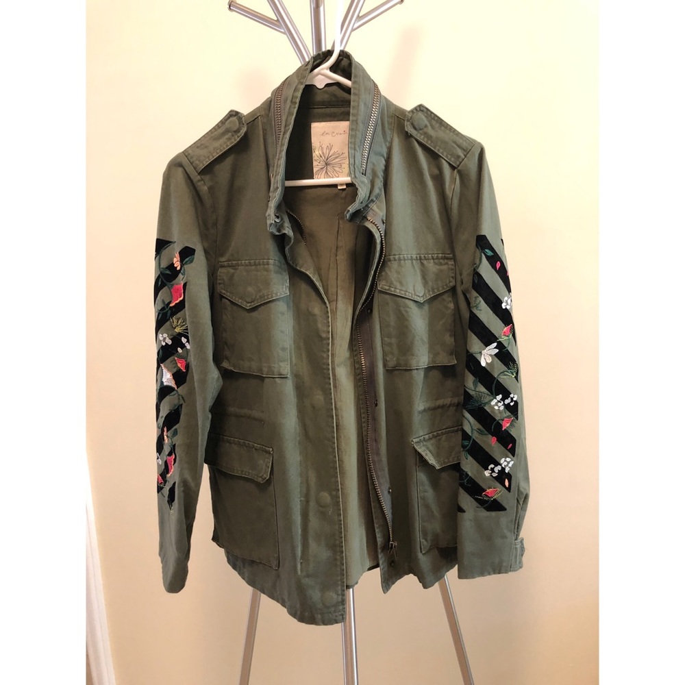 Embroidered sleeve military jacket.